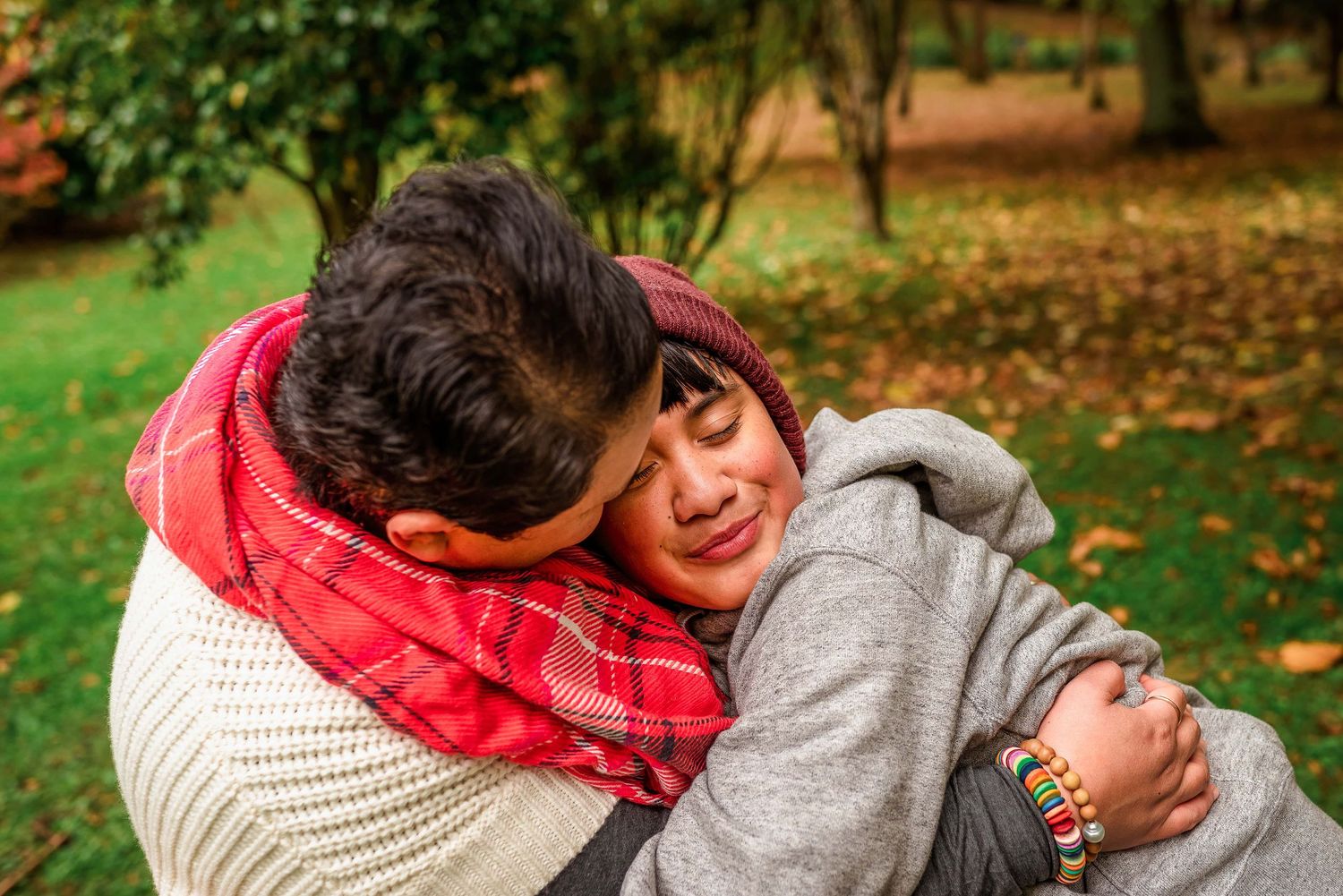 Mother hugging her child who is on the spectrum