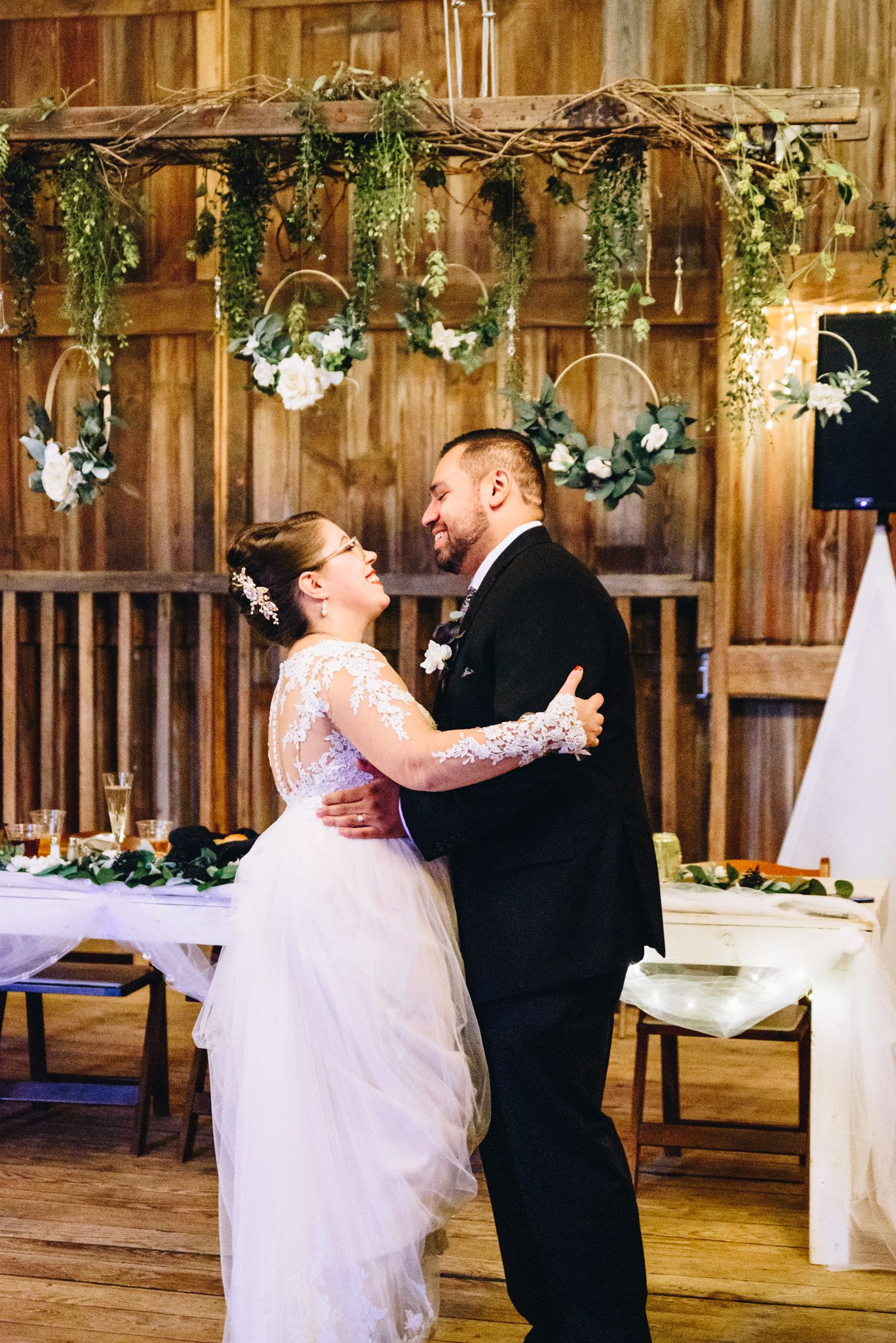 bride and groom smiling at each other during their first dance at the Shepard's Place in Ohio