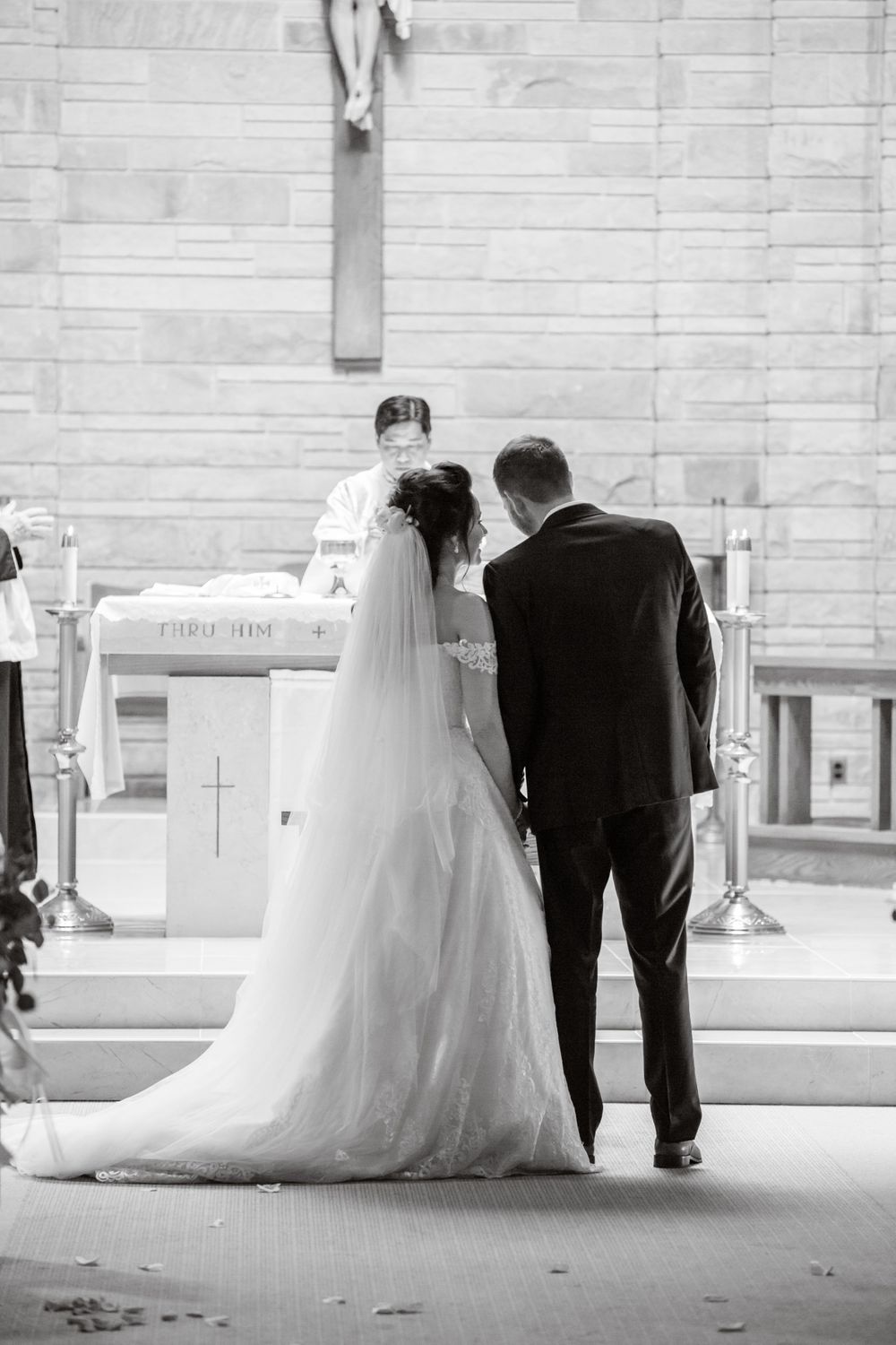 bride and groom at altar michigan wedding photographer