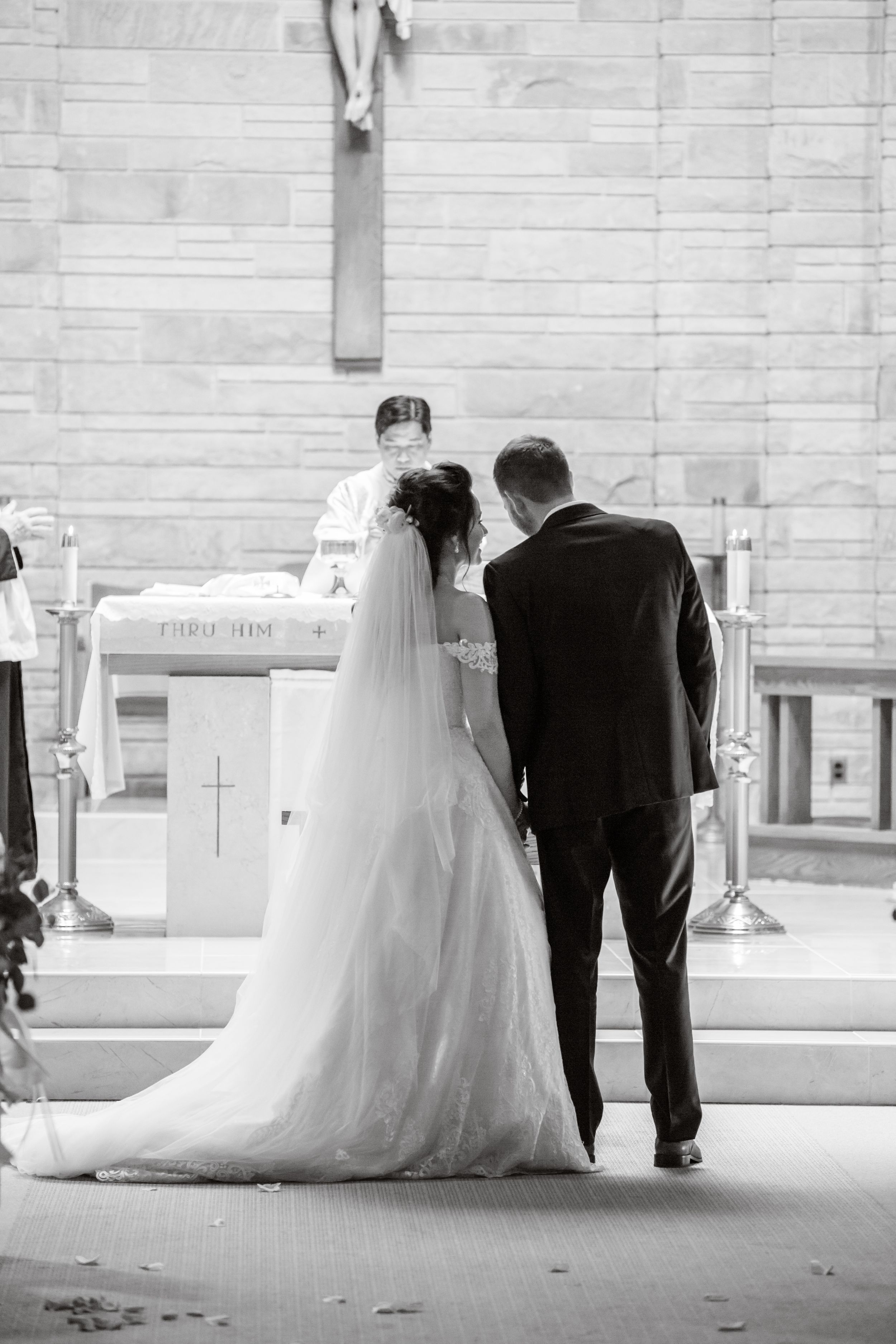 bride and groom at altar michigan wedding photographer