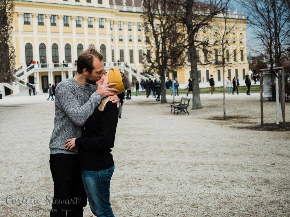 Engaged couple kissing destination holiday in Austria
