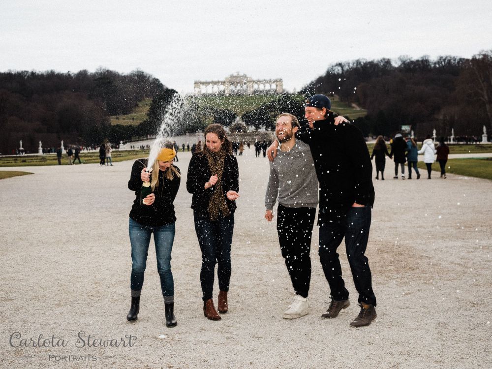 Friends celebrating with Champagne in Vienna, Austria