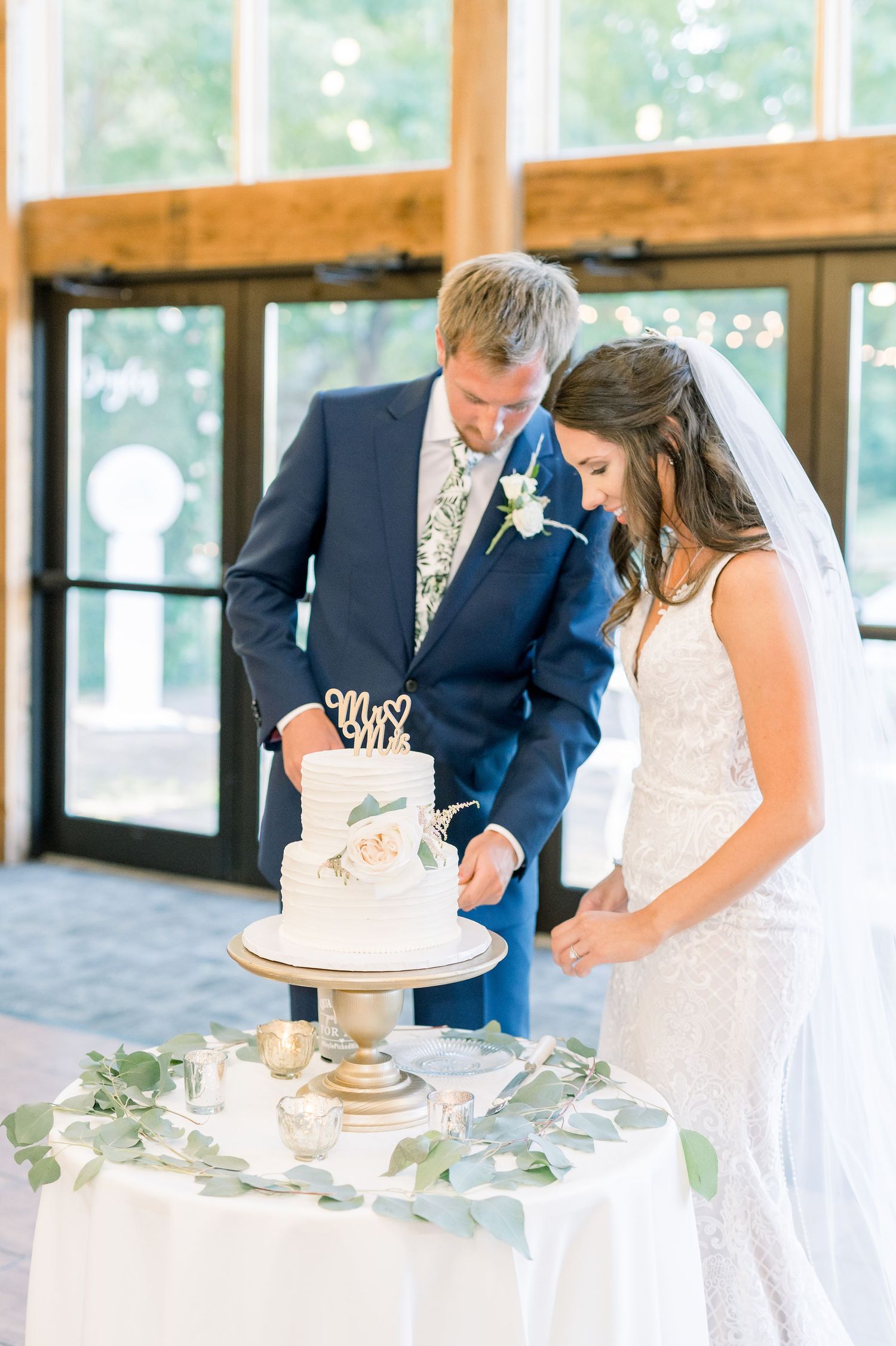 Vineyard photos with white willow events at Prairie Moon Winery wedding in Ames, Iowa