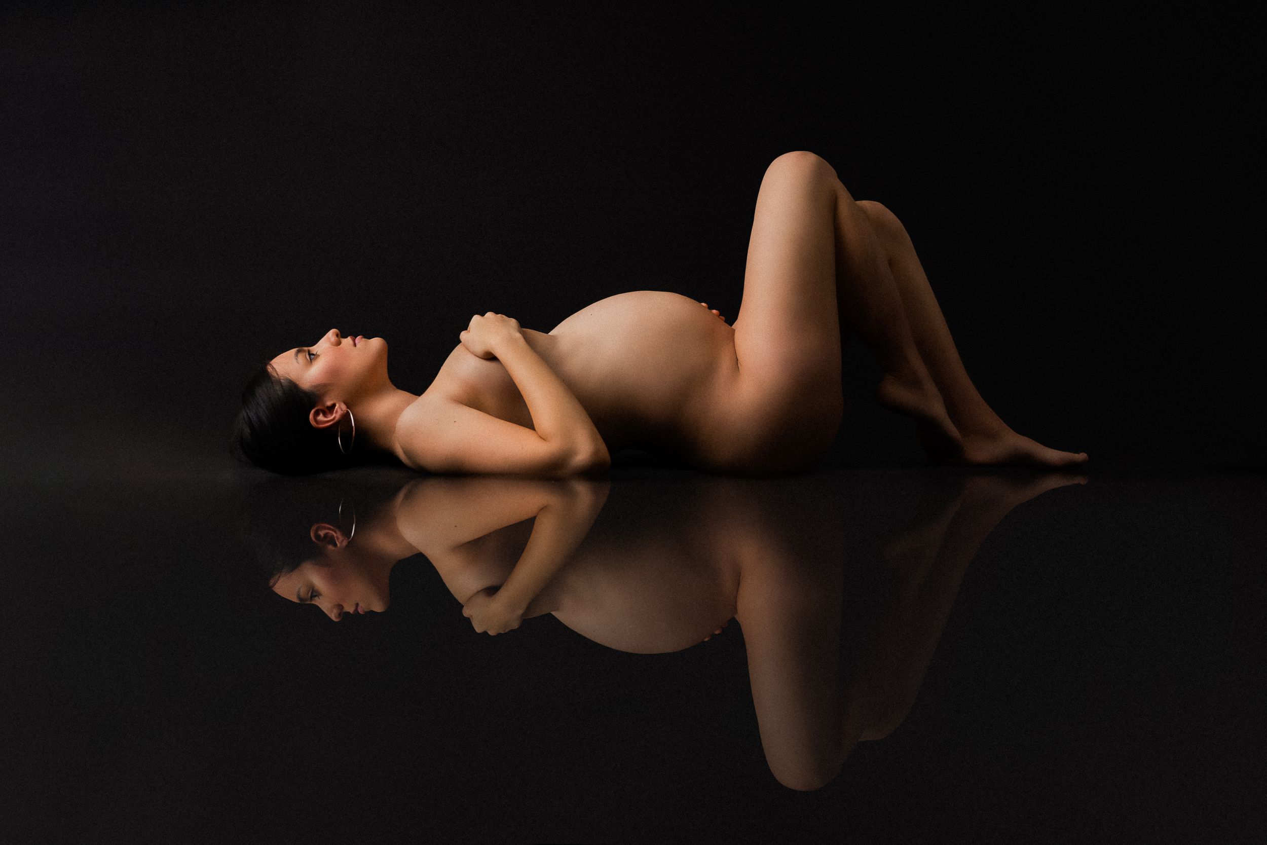 Pregnant woman in suggested nude photo