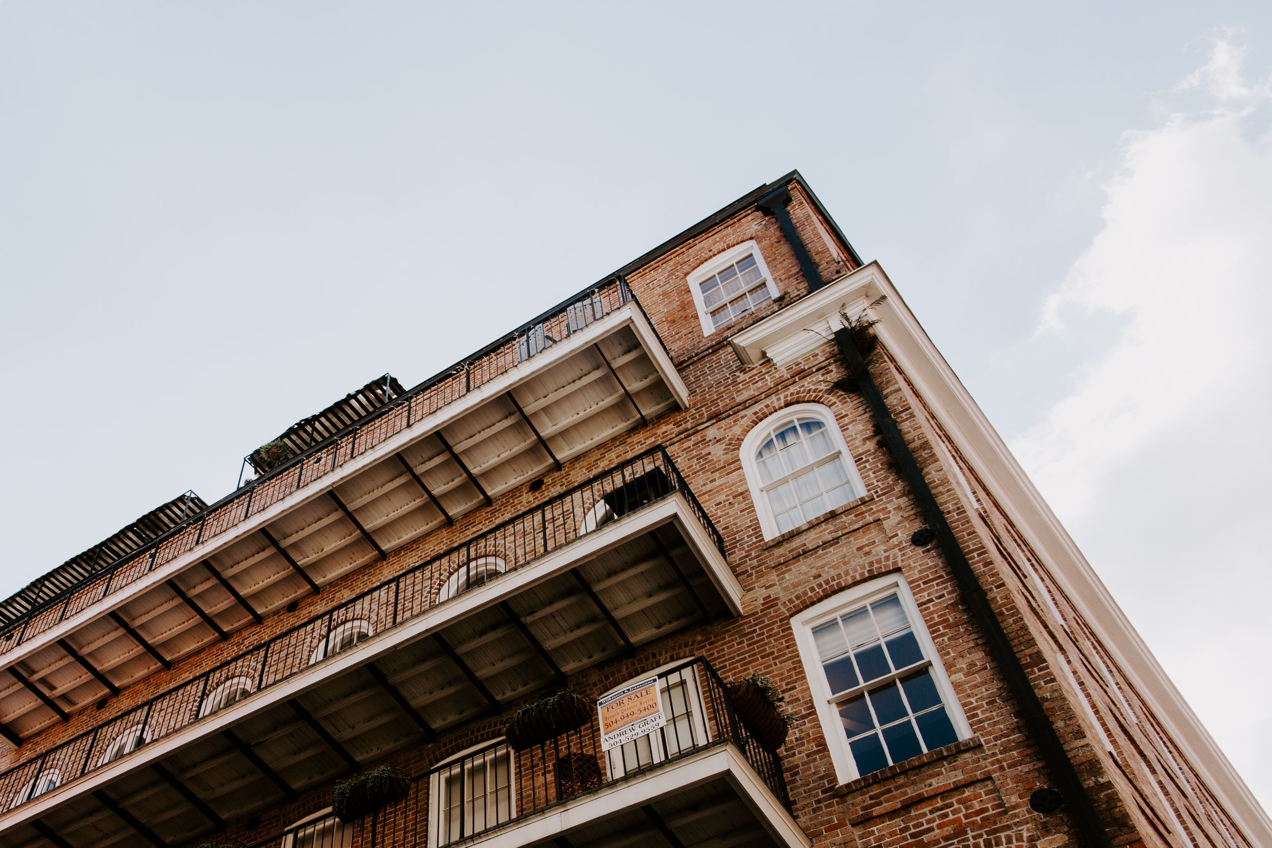 Looking up view of a building in the French Quarter, urban elopement
