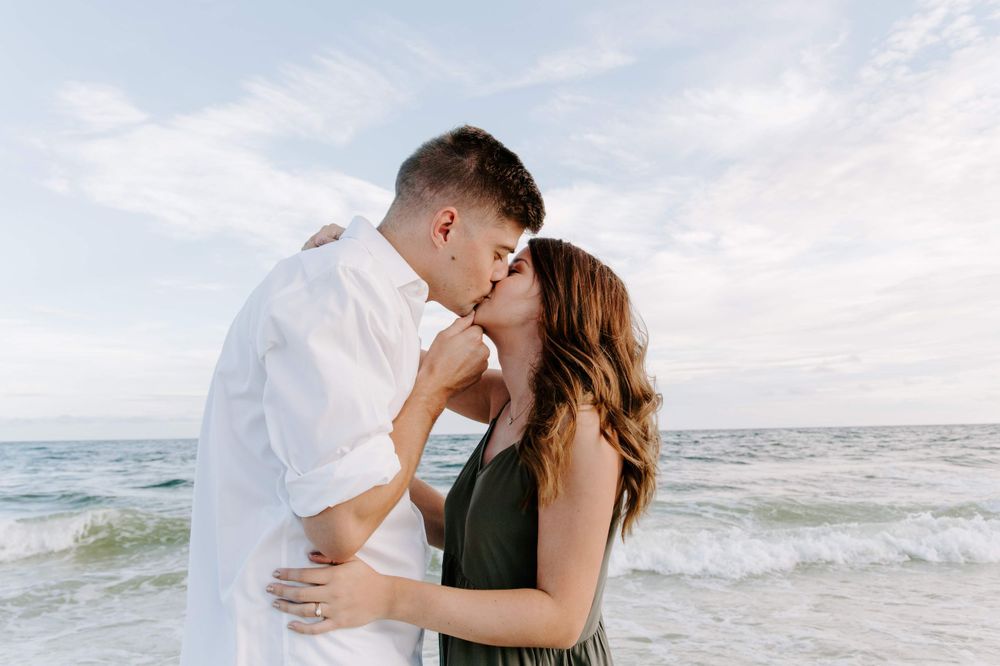 couple kissing during their Destin, FL engagement session