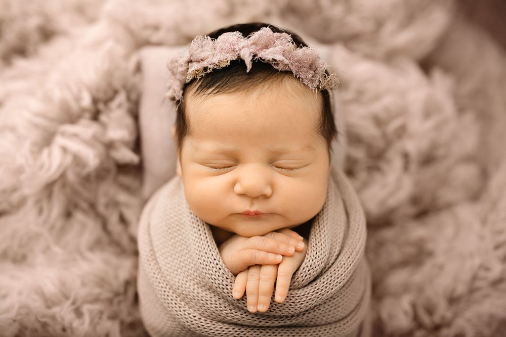 wrapped newborn baby