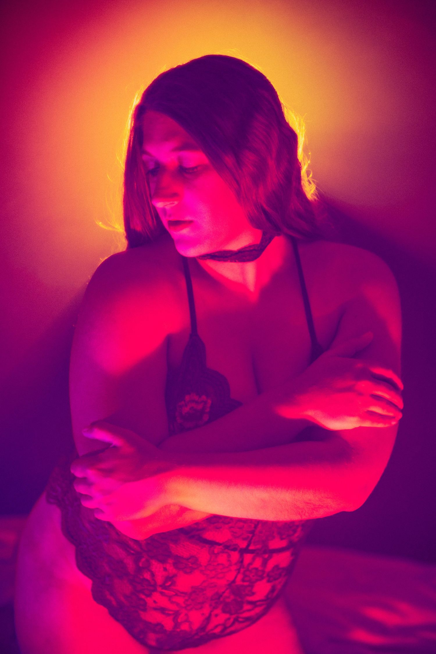 creative image of caucassion woman in lingerie in boudoir pose