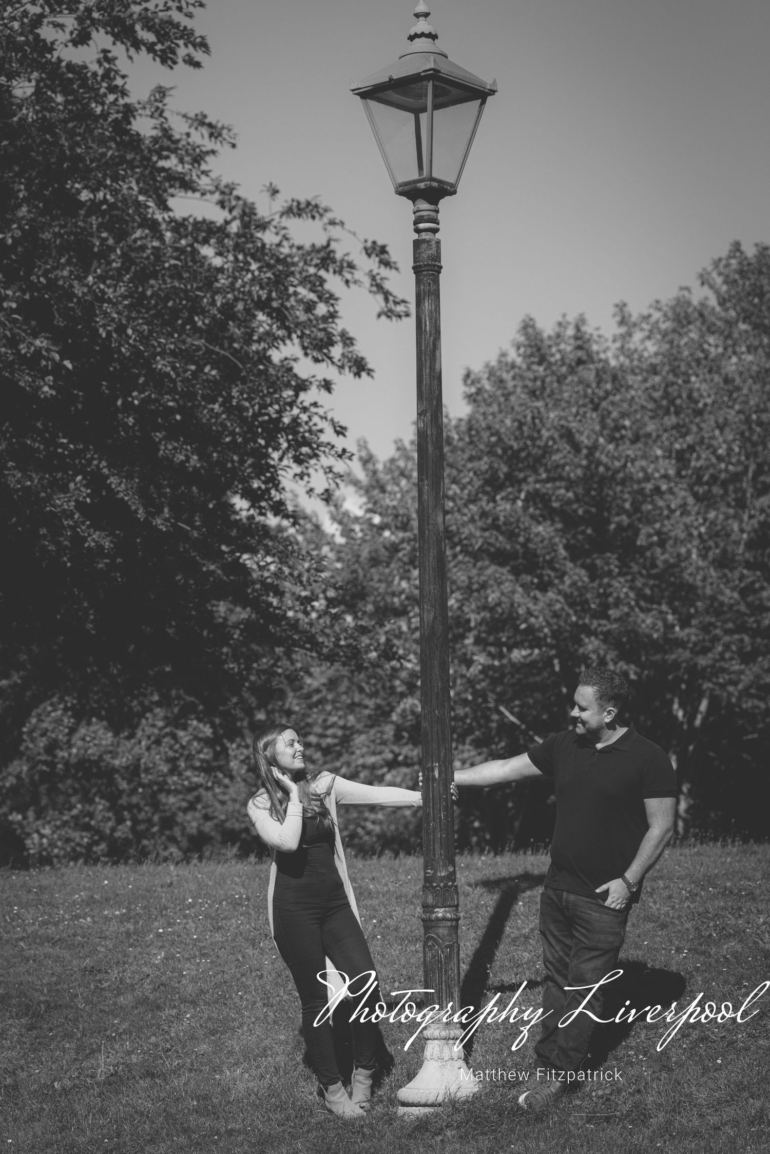 Black & White Naturally posed engagement photography at Sefton Park by Photography Liverpool Wedding Photographer