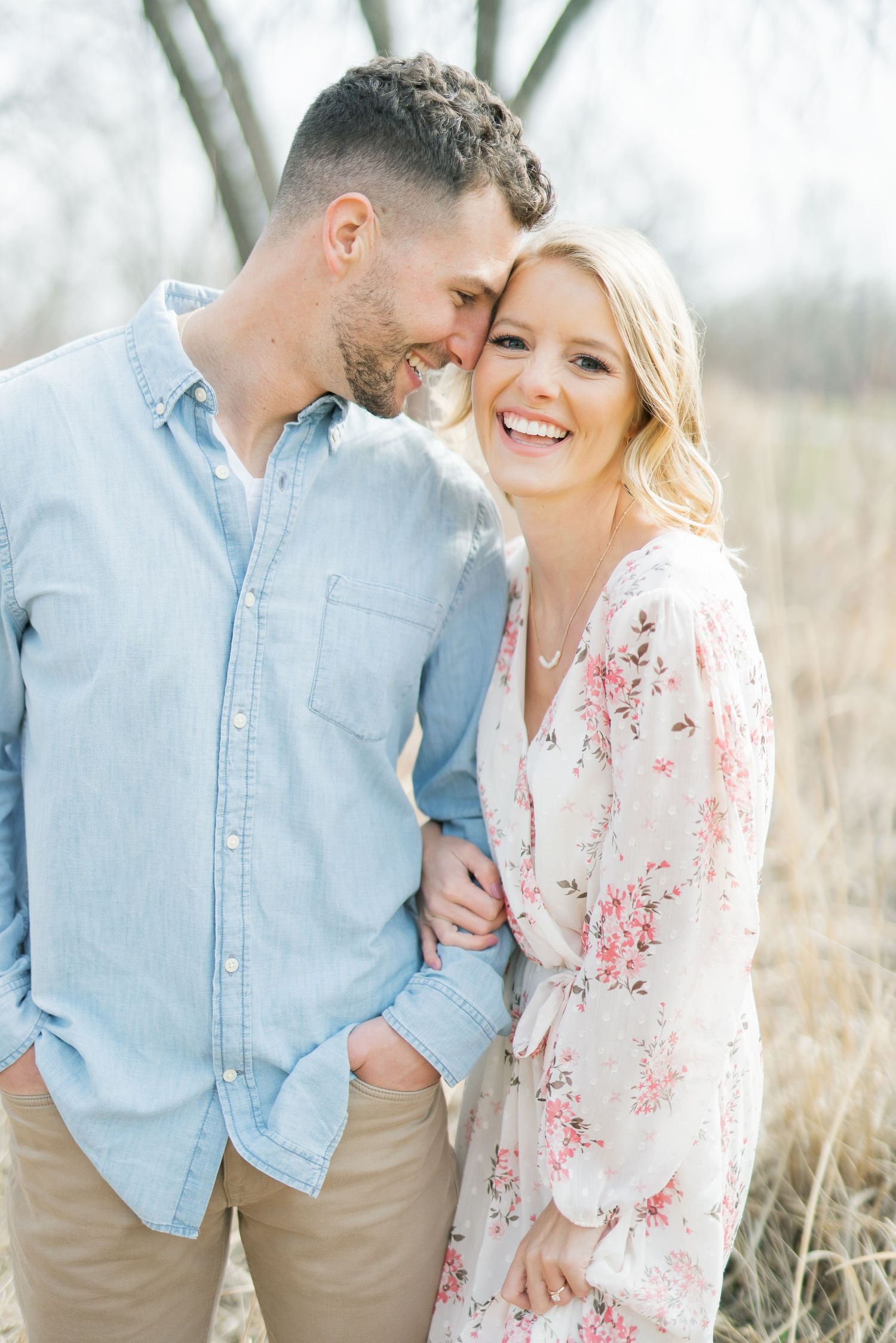 Light and airy film lakeside dock engagement session at Gray's Lake in Des Moines, Iowa