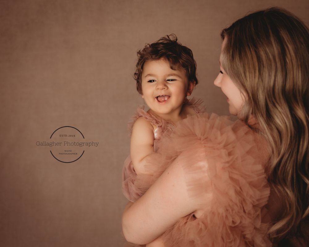 Intimate moment between mother and daughter during studio session