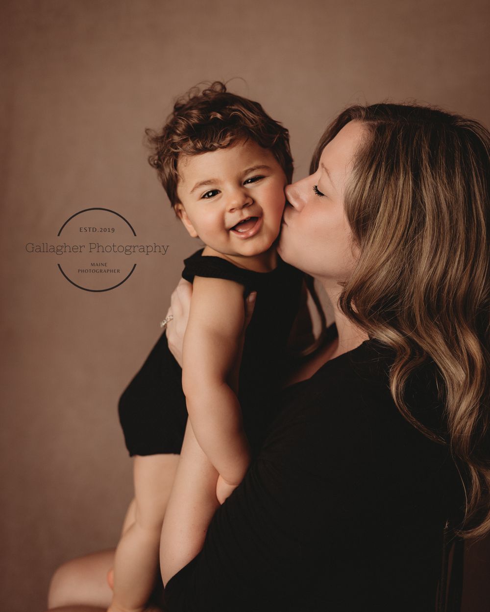Intimate moment between mother and daughter during studio session