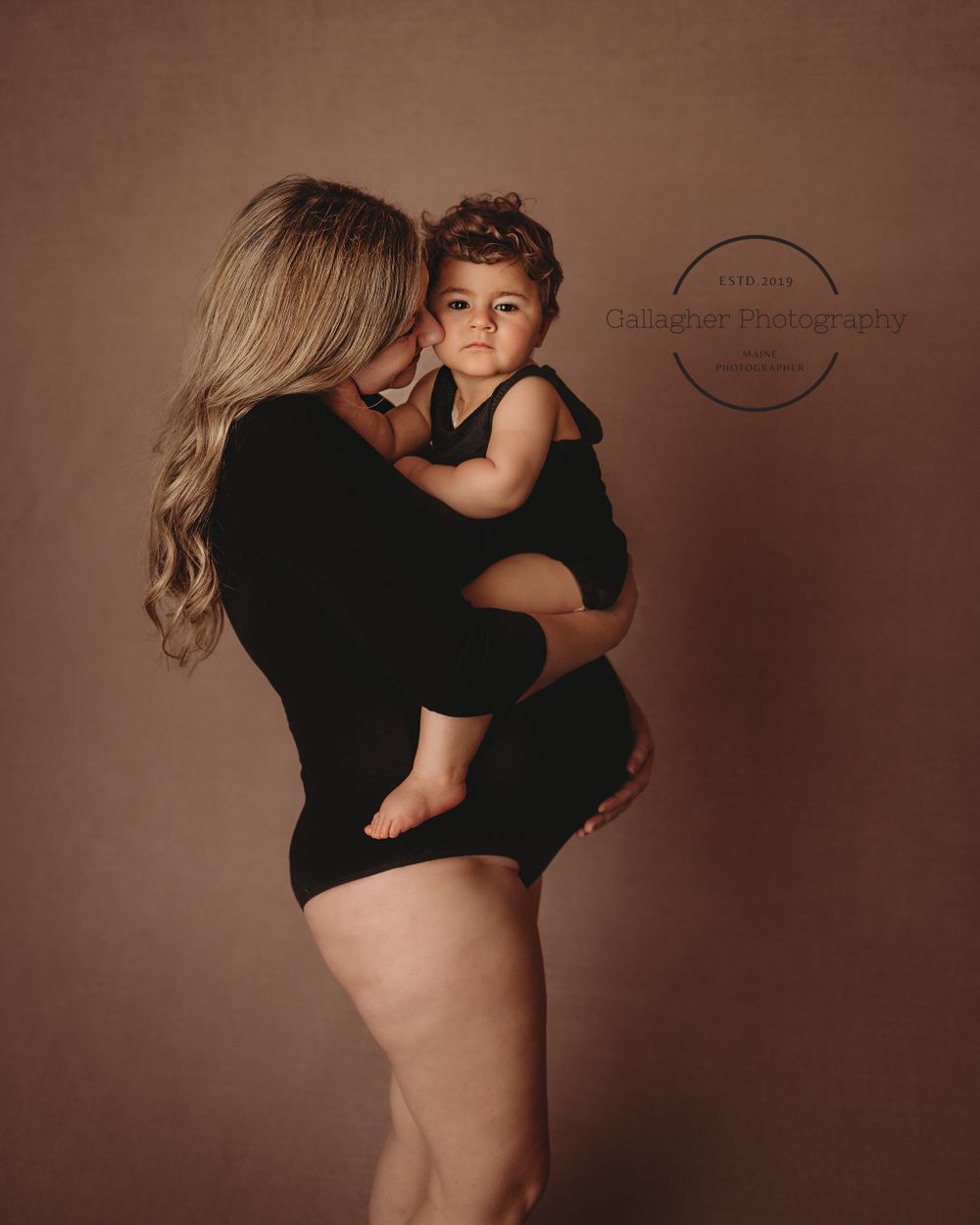 Intimate moment between mother and daughter during studio session
