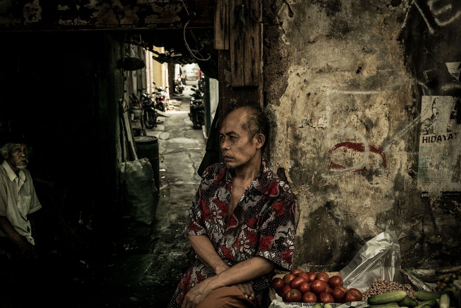 Man selling fruit in the Gloodok district of Jakarta Indonesia