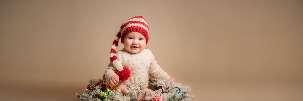Holiday Studio Portrait of a Baby Girl taken by Morgantown Children's Photographer Laura Priestley