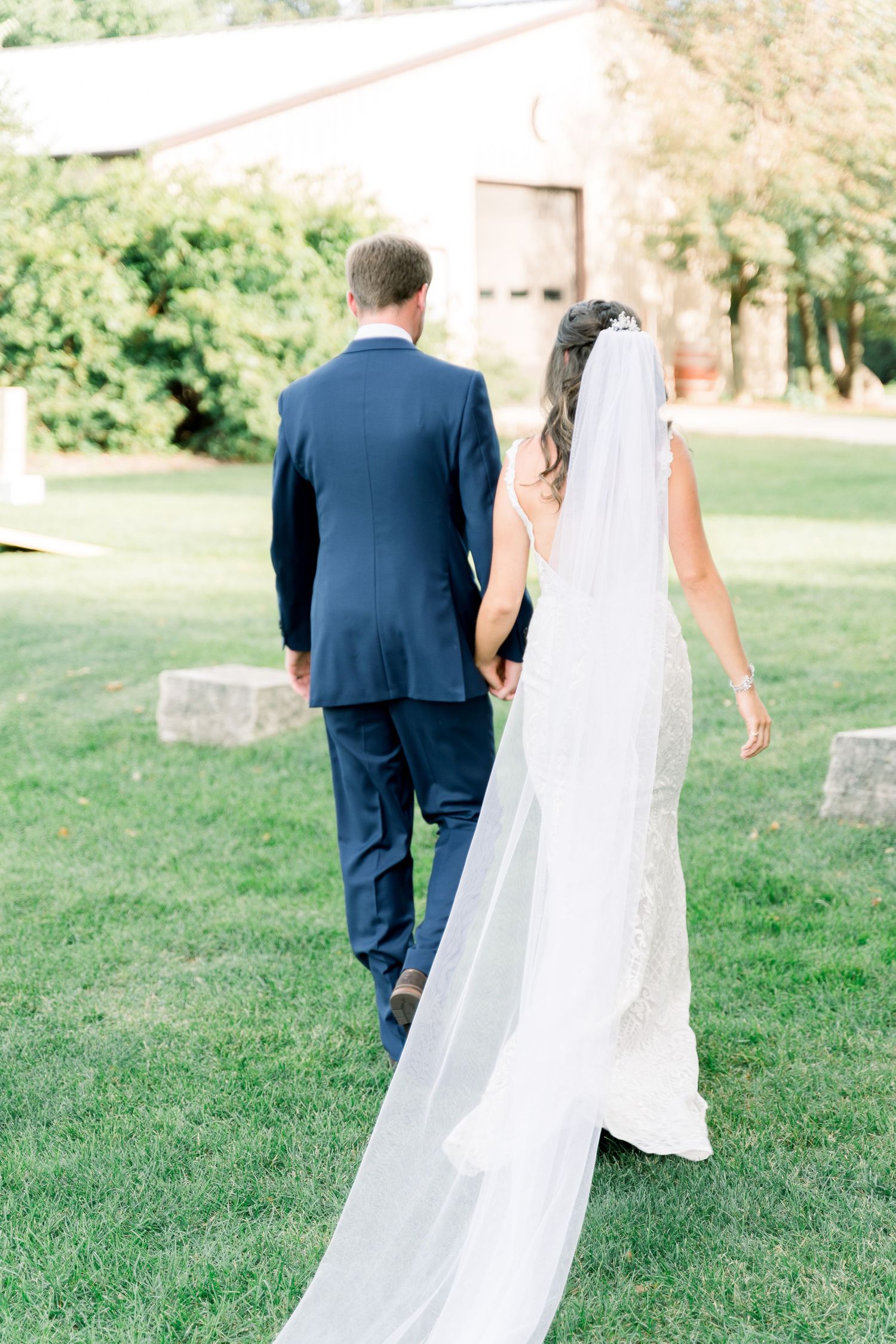 Vineyard photos with white willow events at Prairie Moon Winery wedding in Ames, Iowa