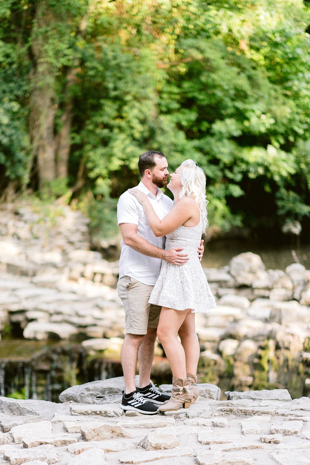 kissing couple Elizabeth Couch Photography Prairie creek engagement photos waterfall