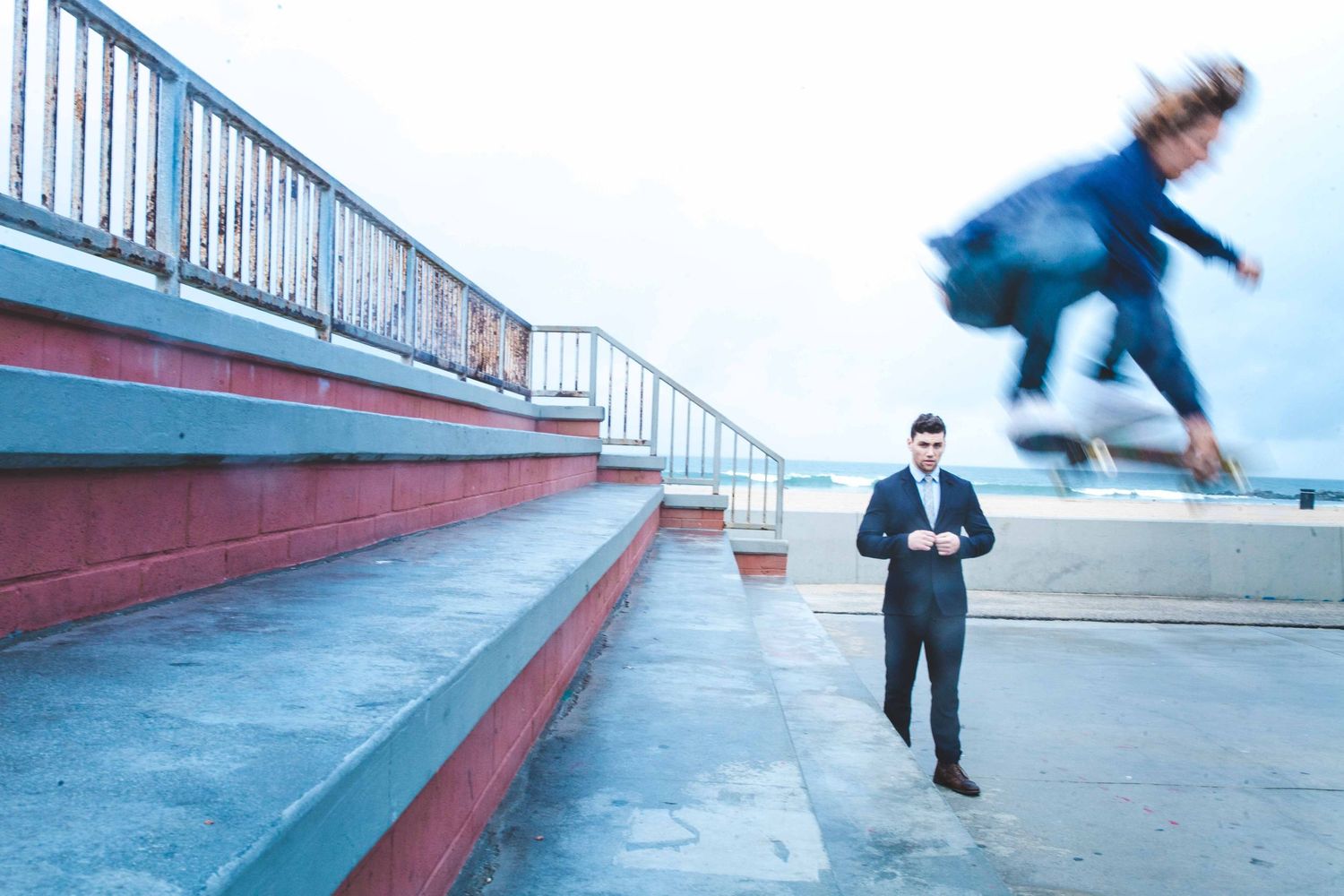 Actor Christian James Smoking in Suit Men's Fashion Trends Handball Court Venice Beach Interview Magazine