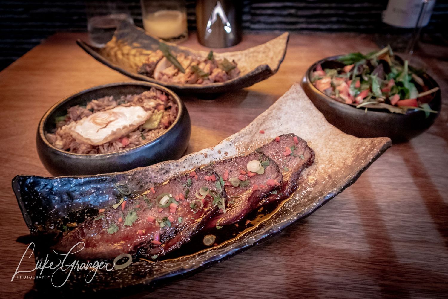 orange and ginger glazed bbq pork chop at the fire pit restaurant at the cave hotel