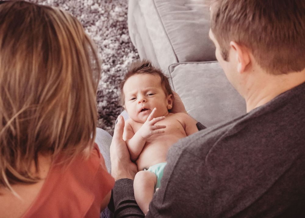 doting new parents Newborn session Seattle