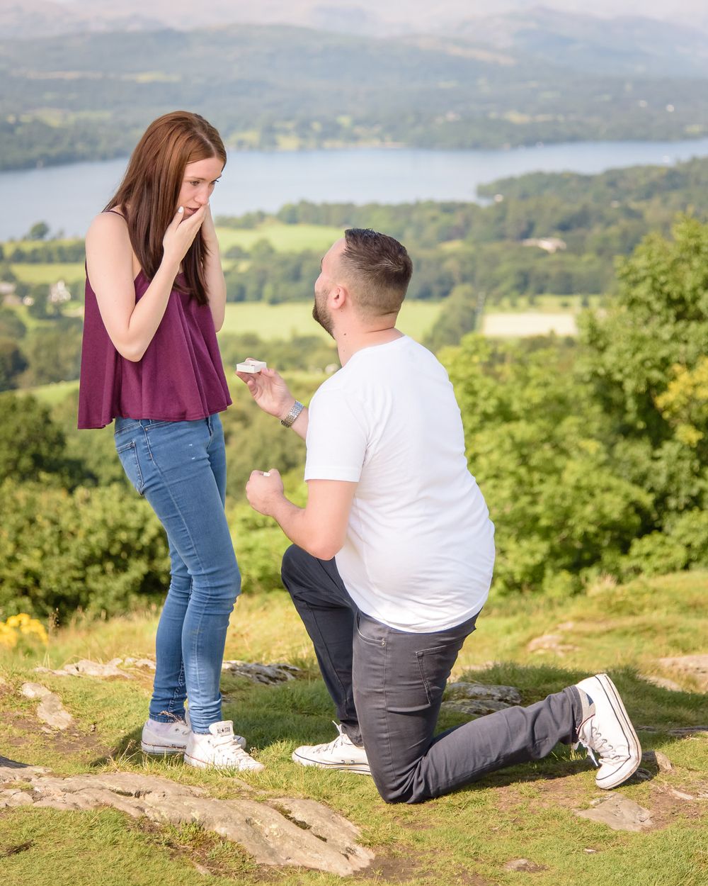 Surprise proposal above Windermere in Lake District