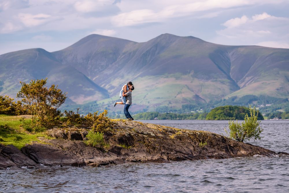 Boy lifts girl in air after she said yes to surprise proposal in Lake District