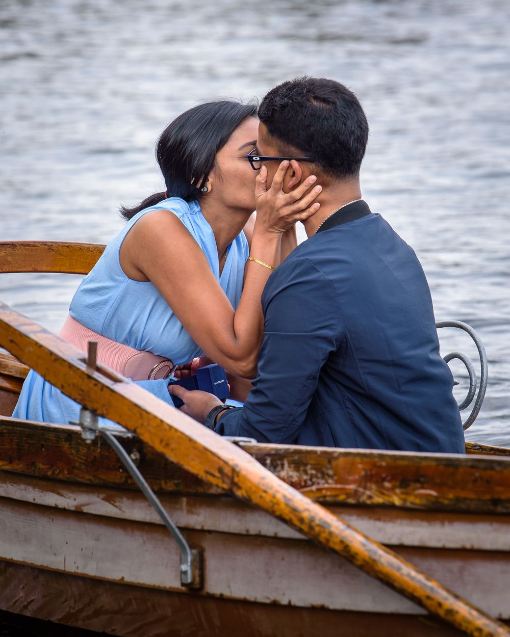 Girl kissing boy after she said I do in Lake District