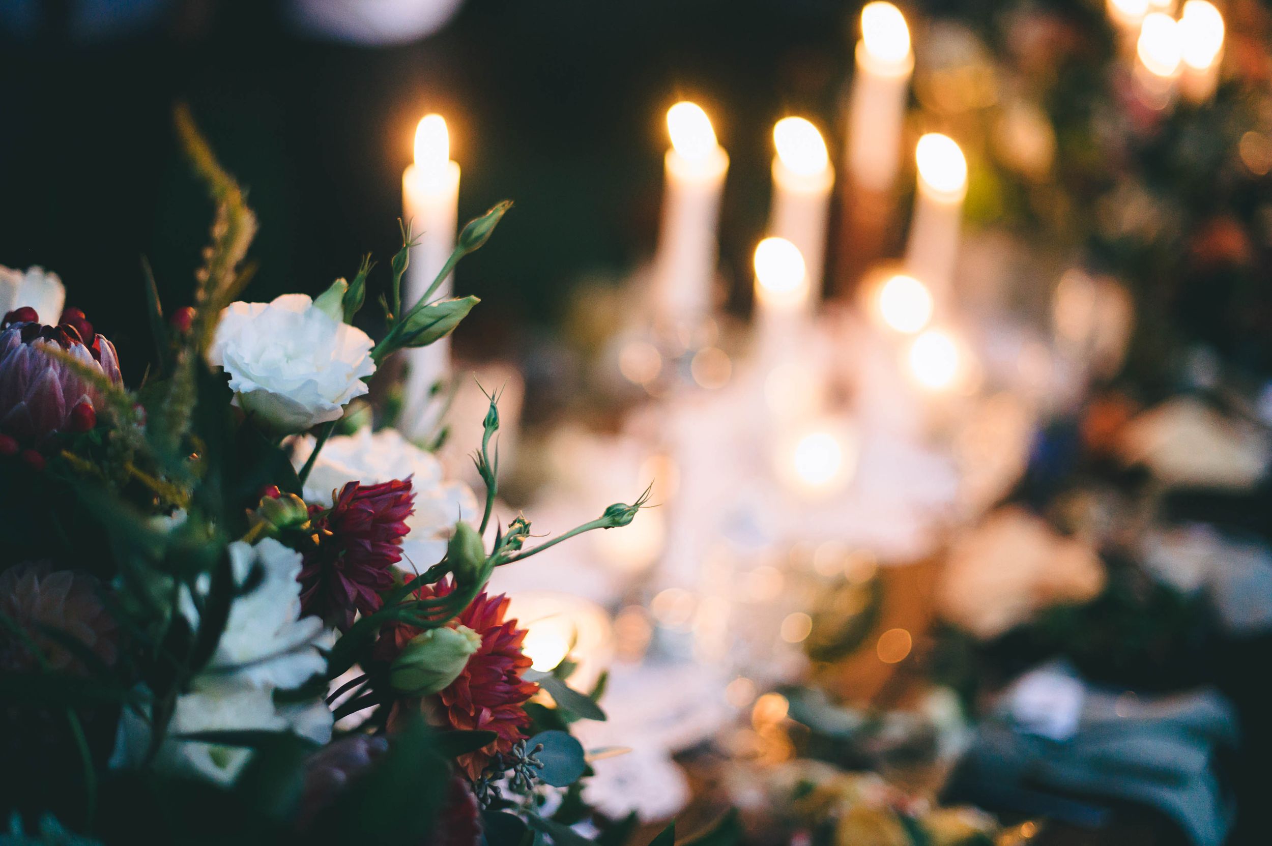 DIY decor with candles and colorful glass wear at this intimate backyard wedding in Santa Cruz