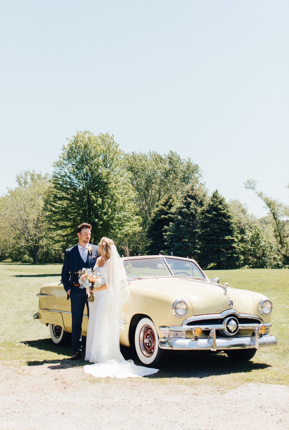 Sam's brother surprises her with a vintage car for photos on her wedding day.