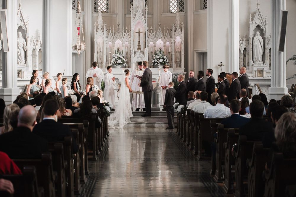 Traditional church ceremony captured by Mississippi wedding photographer at Storyhouse