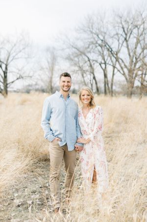 Light and airy film lakeside dock engagement session at Gray's Lake in Des Moines, Iowa