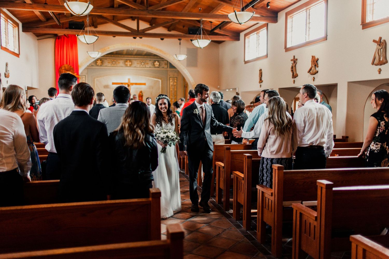 bride and groom walking down the aisle