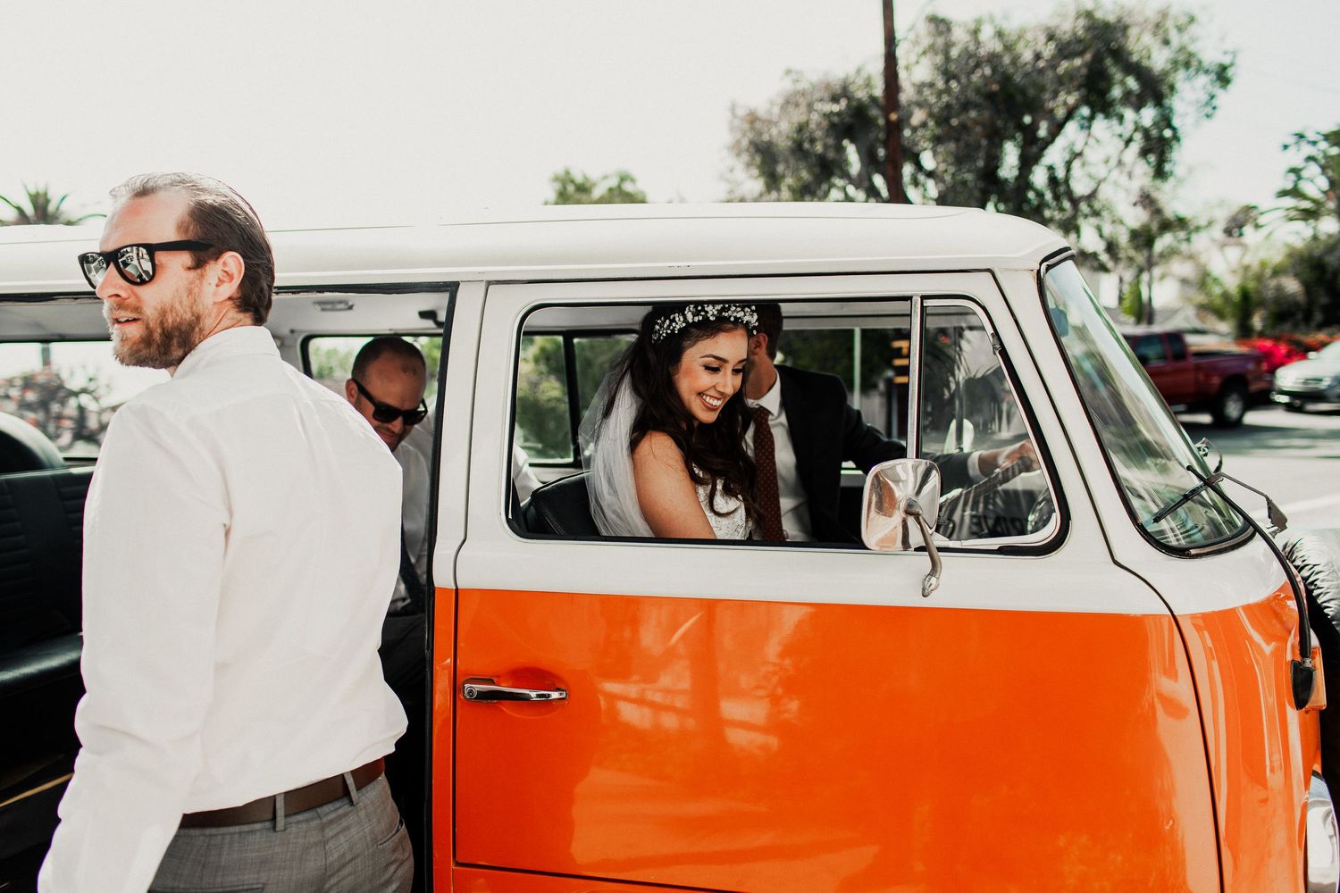 bridal party getting inside volkswagon van