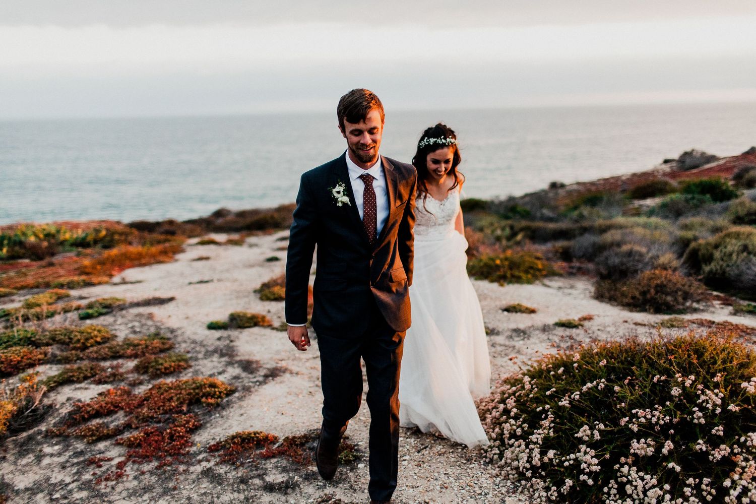 bride and groom walking towards camera
