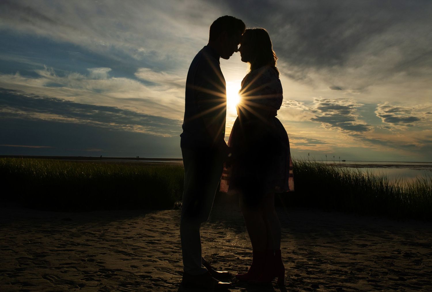 Couple gets engaged at Orleans beach near Rock Harbor