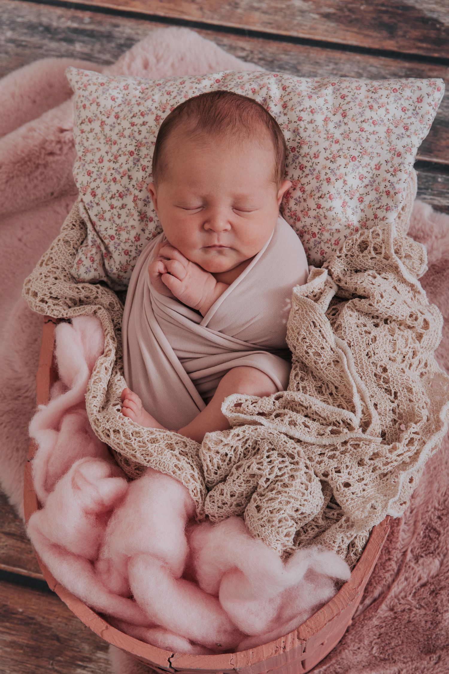Newborn baby girl in pinks by devon newborn photographer Melanie Barnfield