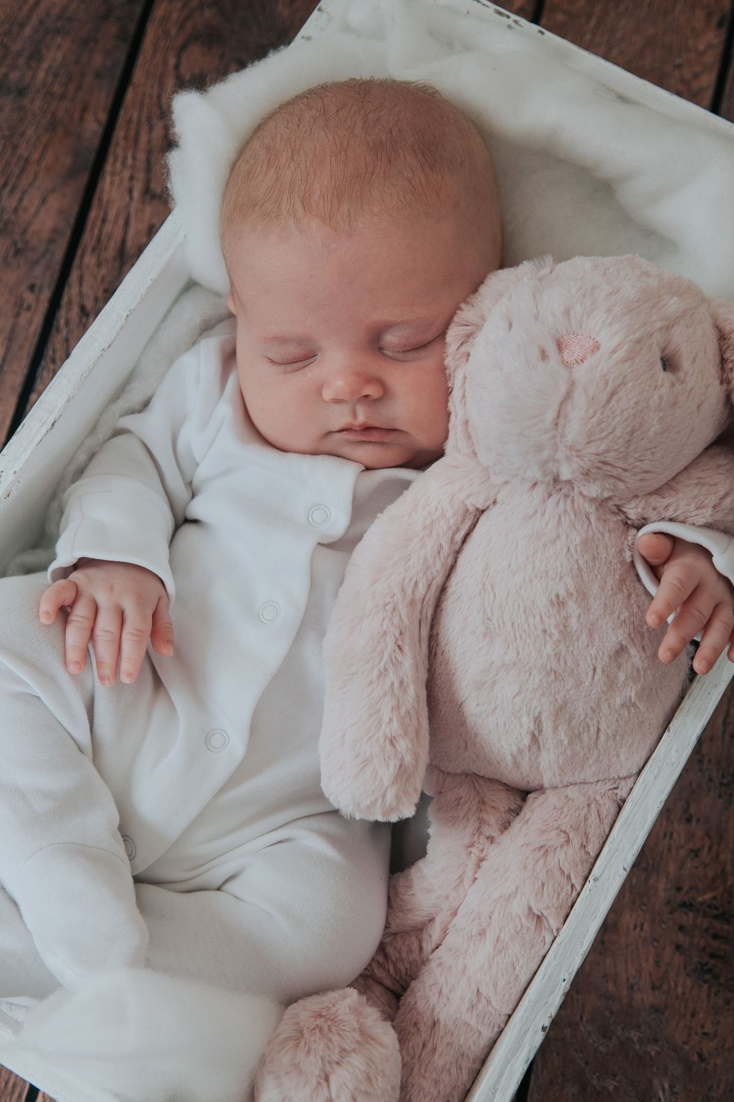 Cute baby and her bunny by Melanie Barnfield Photography