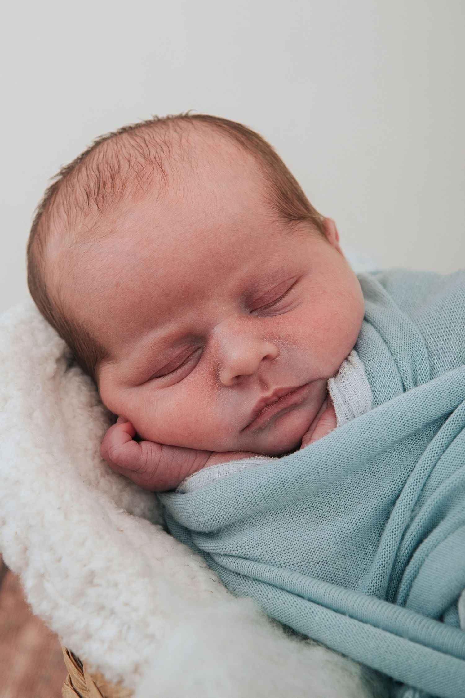 Newborn baby sleeping by devon based photographer Melanie Barnfield