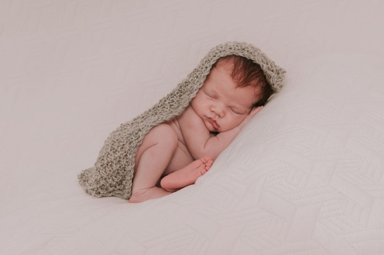 Newborn boy sleeping by devon based photographer Melanie Barnfield