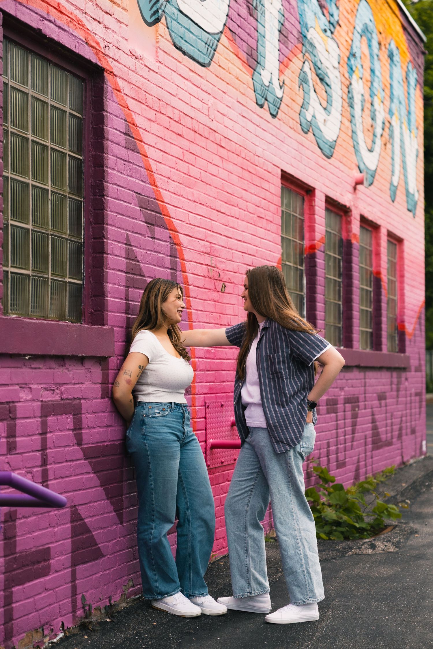 madison wi couples engagement photographer monroe street mural triangulador lauer realty group lgbtq colorful unique photos wisconsin urban