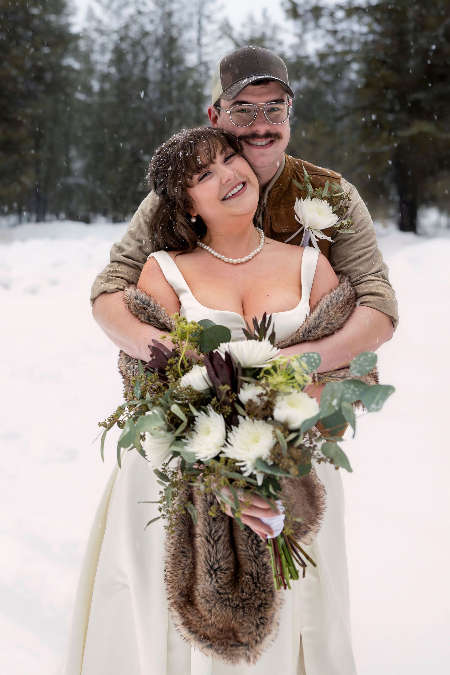 Winter wedding bride and groom portrait