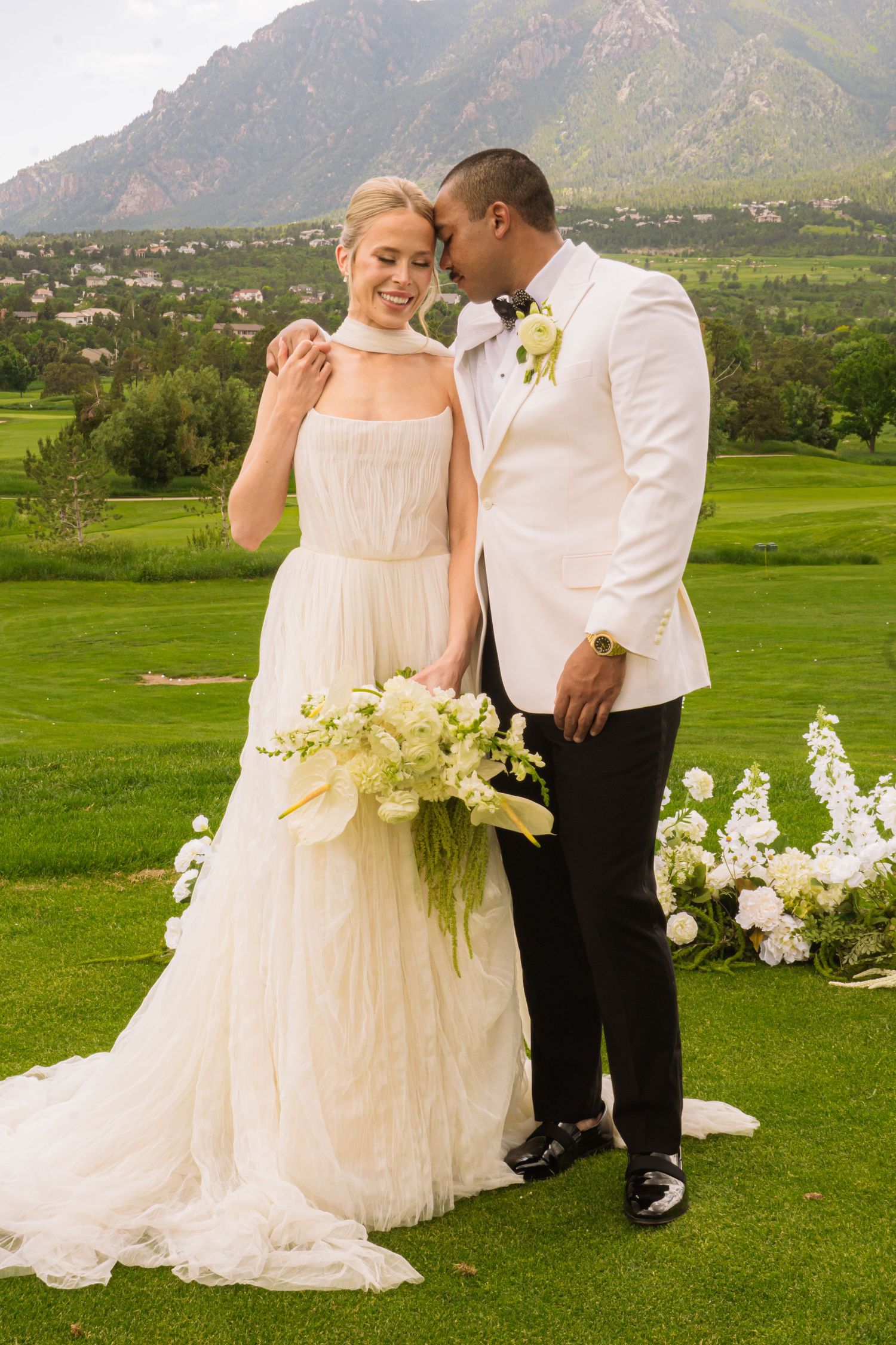 Colorado Springs Wedding Photographer. Photo of the bride and groom posing.