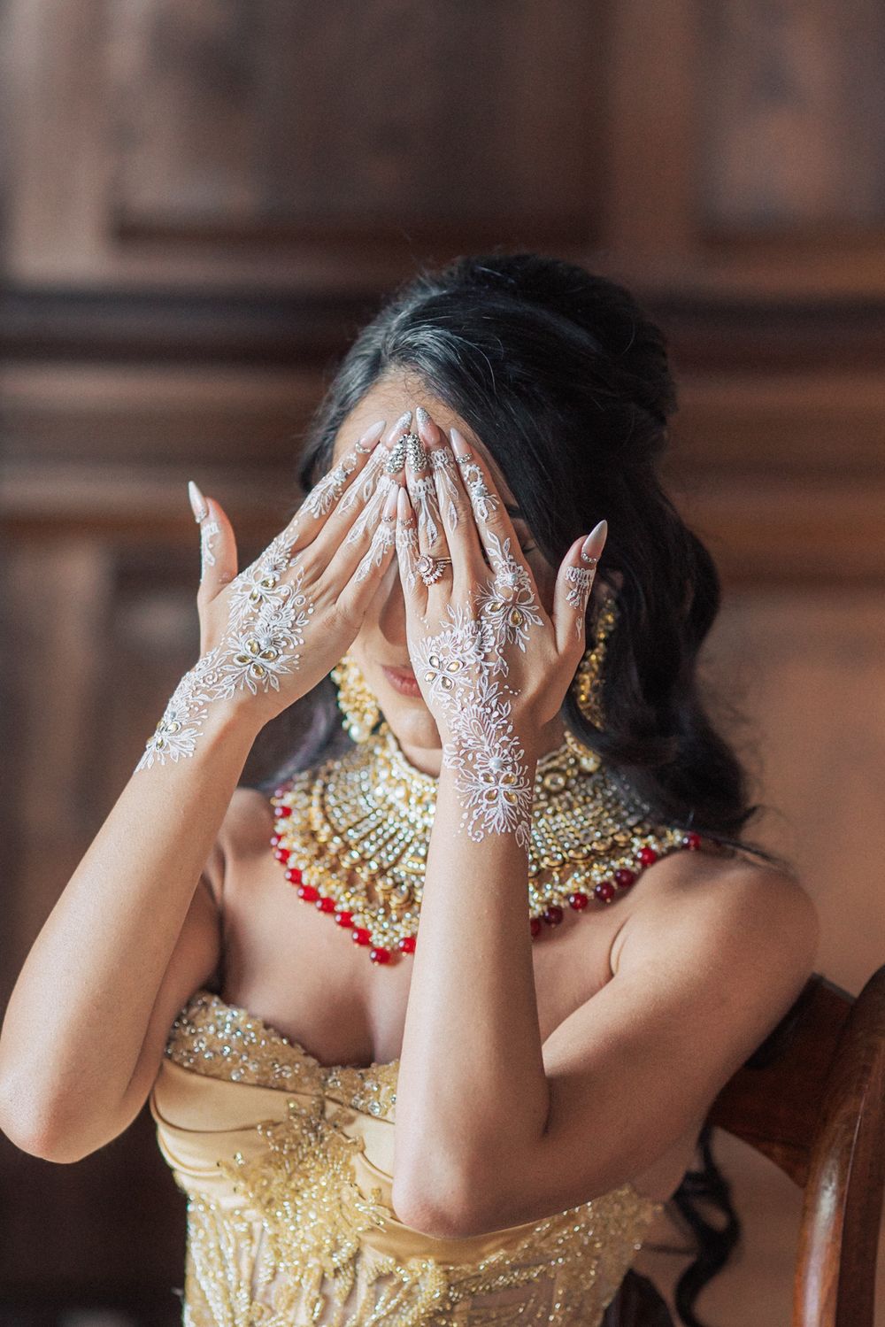 Bride in a stunning lehenga at her LGBTQ+ wedding, captured by an Indian destination wedding photographer in Portugal – Forte da Cruz