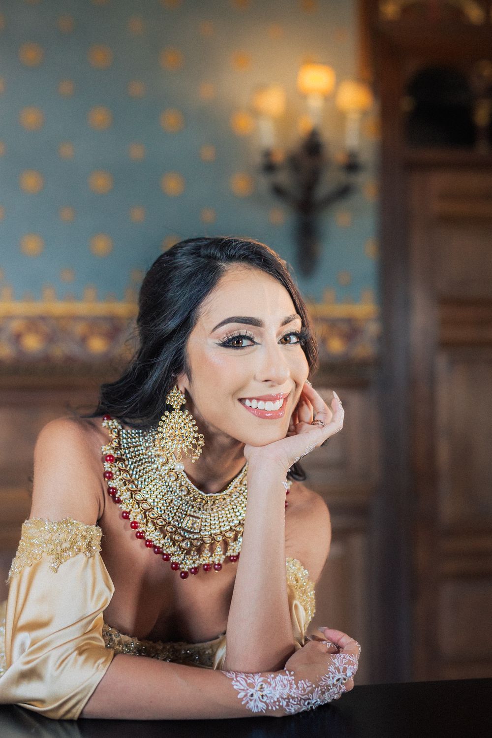 Bride in a stunning lehenga at her LGBTQ+ wedding, captured by an Indian destination wedding photographer in Portugal – Forte da Cruz