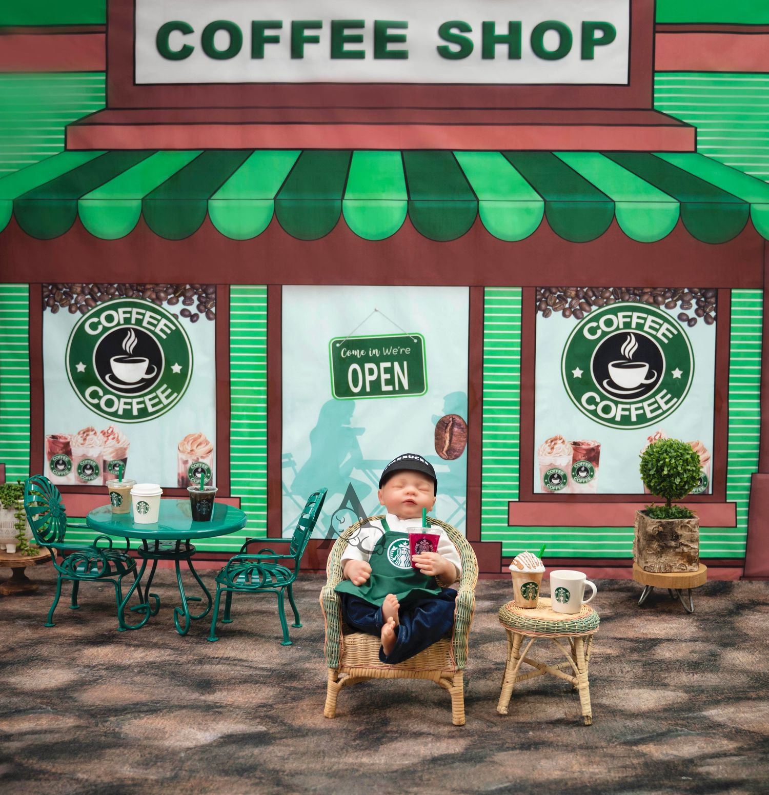 Charming green coffee shop storefront with striped awning and outdoor seating area.
