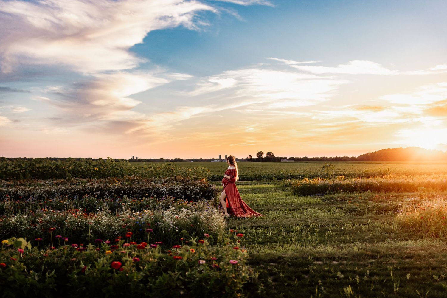 Outdoor family maternity session in Marion Indiana inside wildflowers