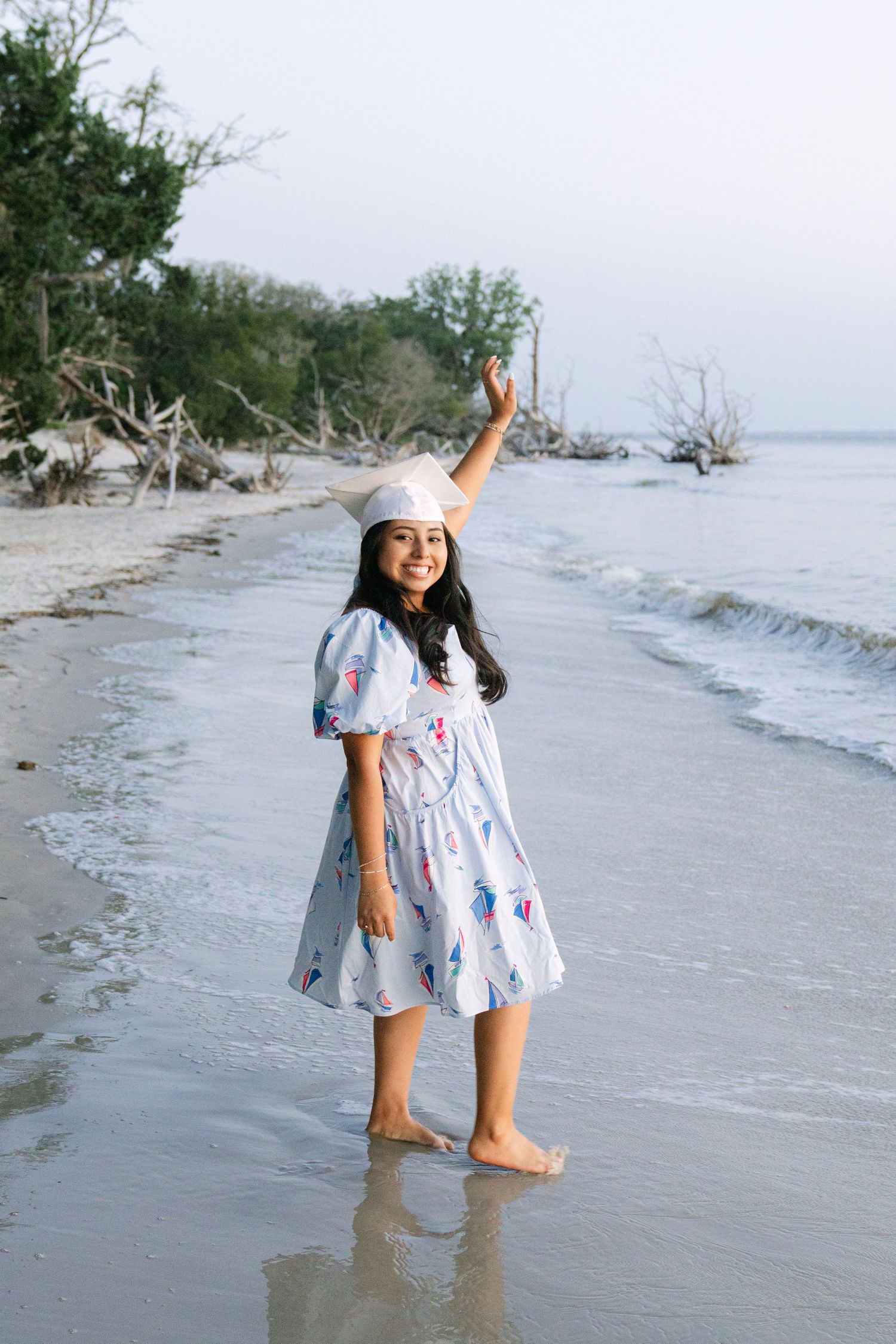 A bright senior session on Jekyll with beach views and personal flair. Heidi’s beachy, joyful senior portraits on Jekyll Island.