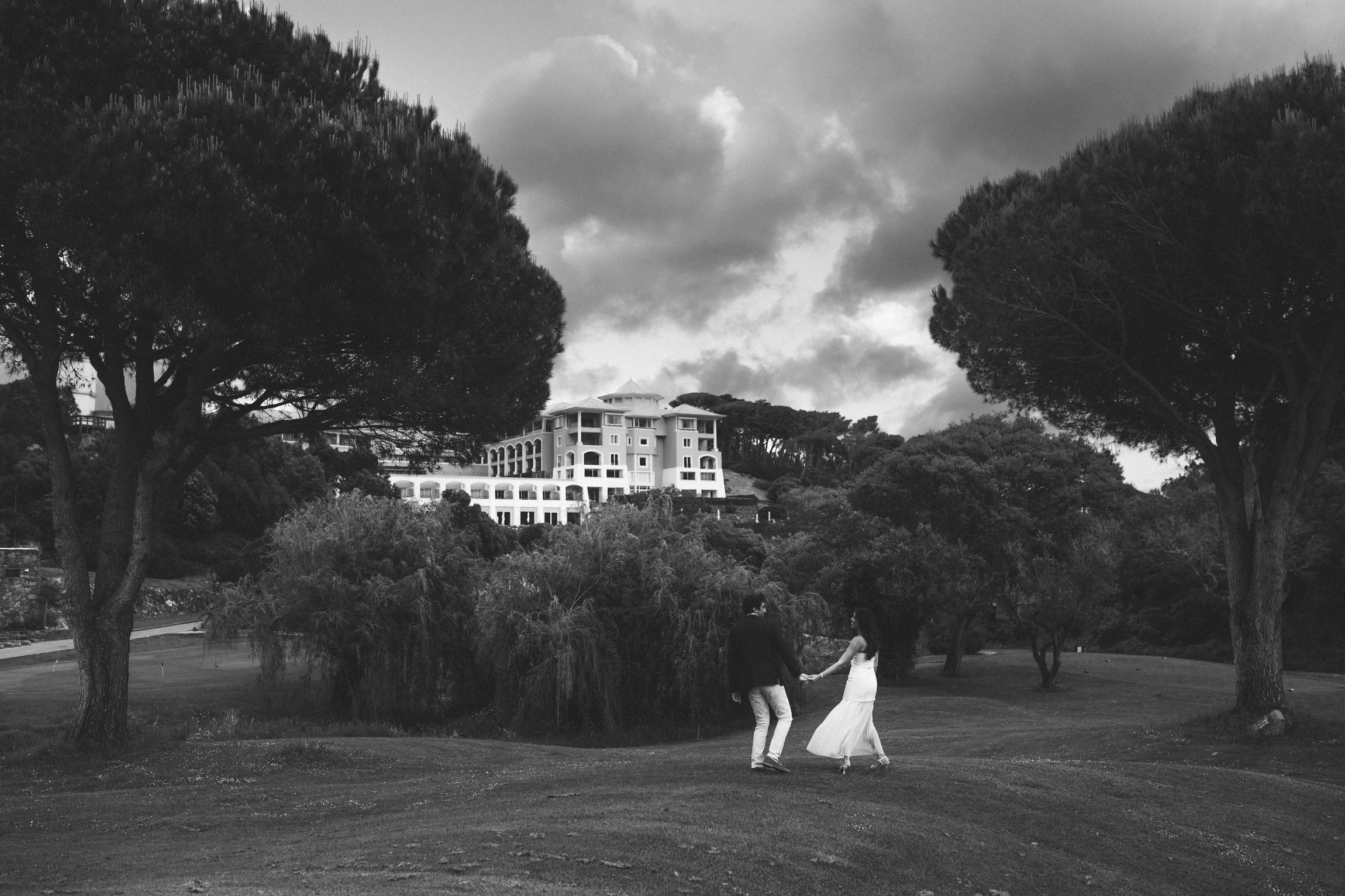 Romantic engagement photo-shoot in Sintra, Portugal, with an Indian couple exploring Penha Longa. By a destination wedding Photographer