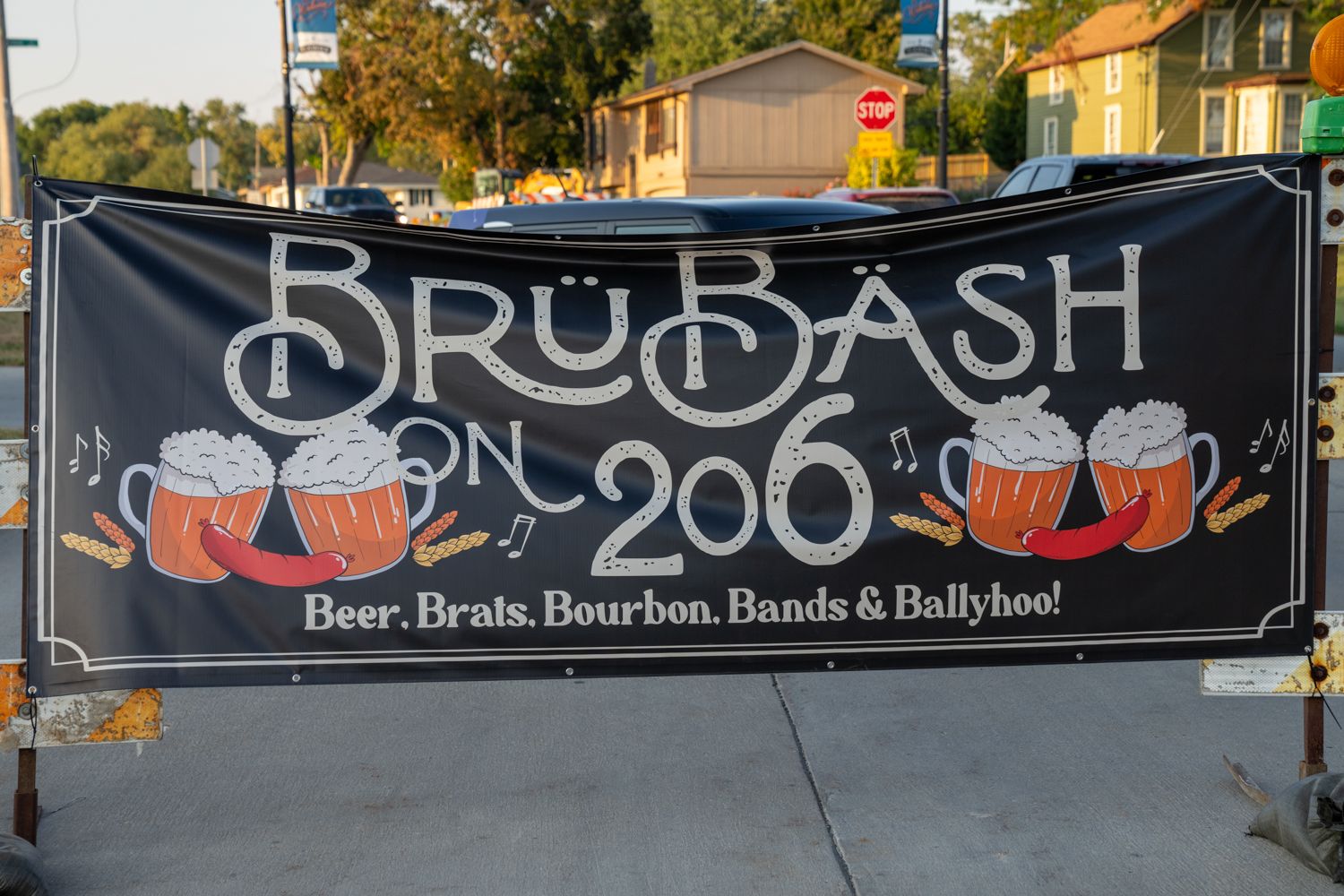 Black banner advertising BruBash 2023 event featuring beer mugs and text.
