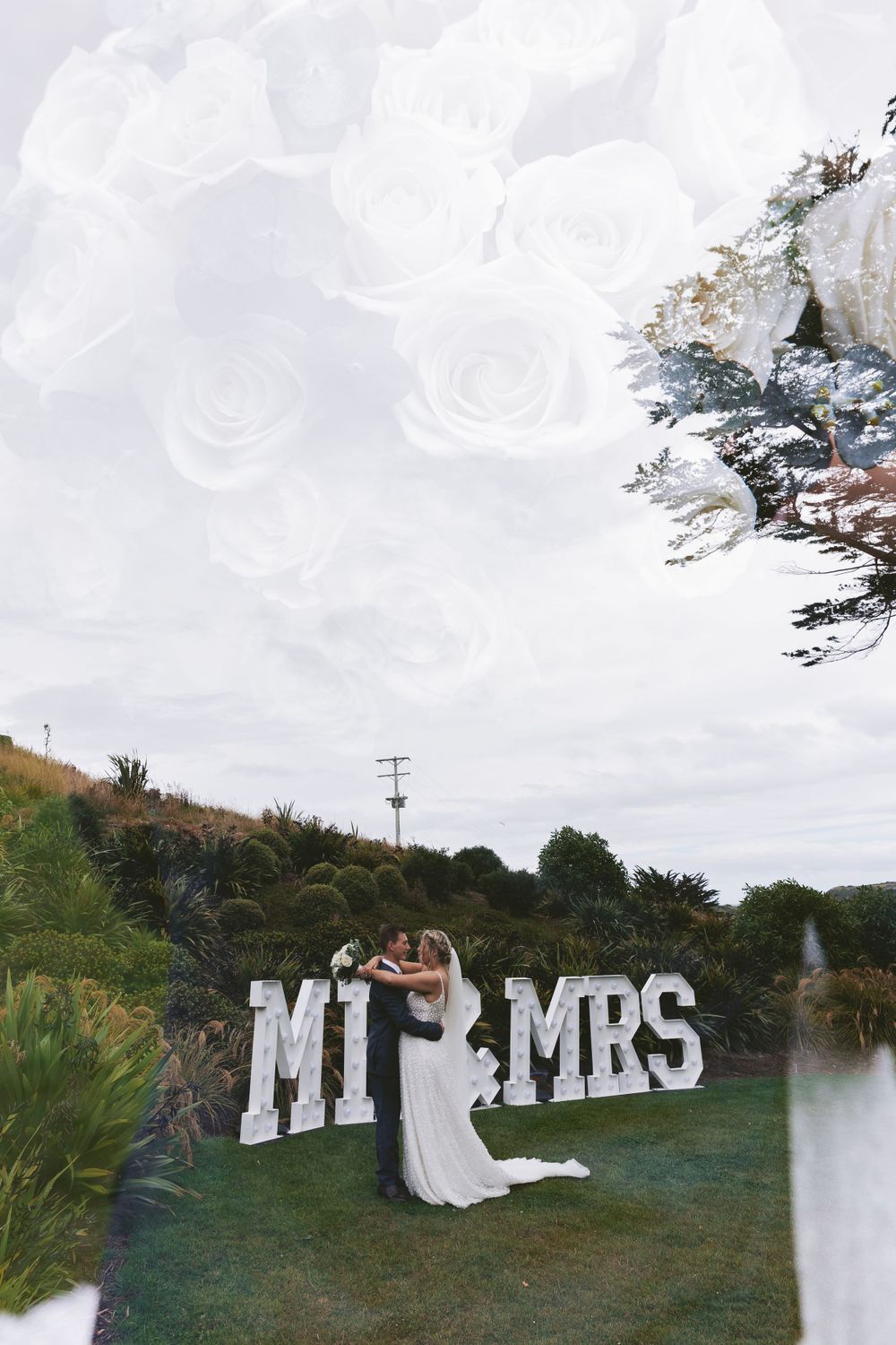 Double exposure wedding photo with roses overlaid on couple by MR&MRS sign.